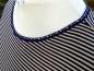 Preview: Elastisches Einfassband - blau mit goldenen Pfeilen Preview: Elastisches Einfassband - blau mit goldenen Pfeilen