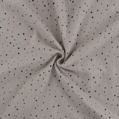 Musselin drapiert Schimmer sand mit schwarzen Punkten