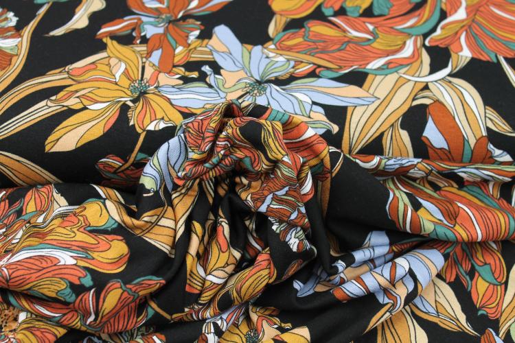 Viskosejersey "Wild Flowers" schwarz beige hellblau