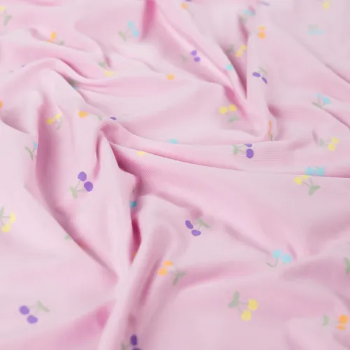 Stoff Jersey mit Kirschen rosa drapiert