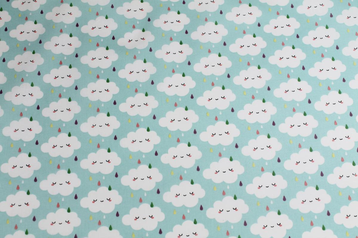 Beschichtete Baumwolle „Wolken“ mint