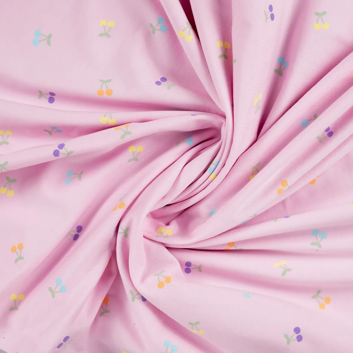 Baumwolljersey rosa mit Kirschen drapiert