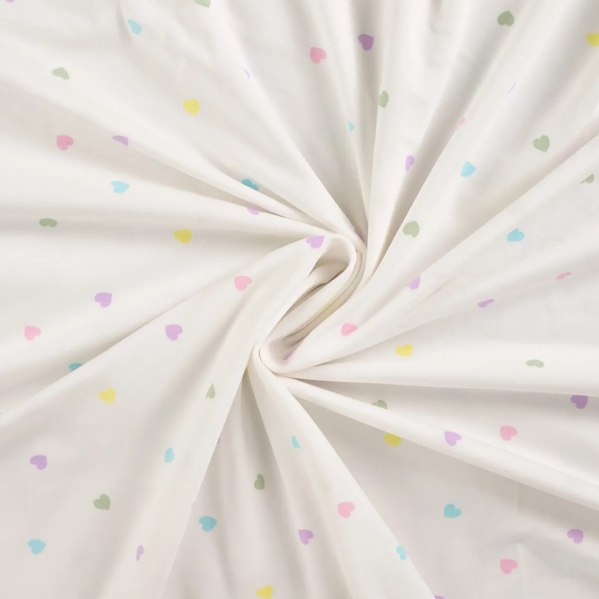 Jersey Stoff Herzen bunt weiß elastisch drapiert