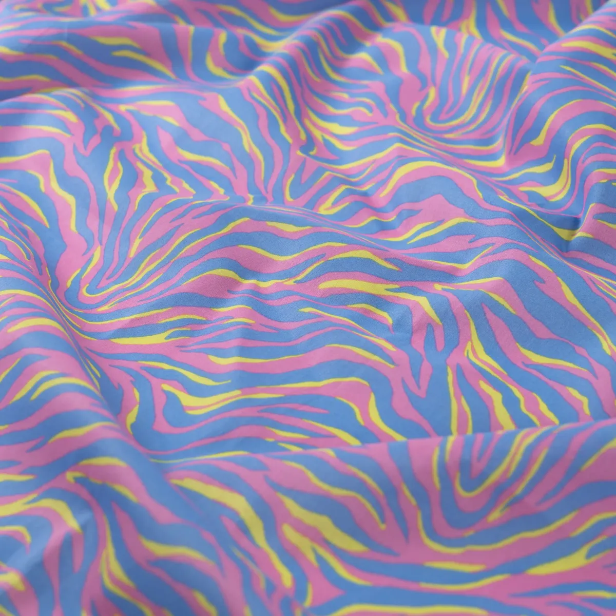Baumwoll Voile mit Zebra Muster in Flieder und Rosa